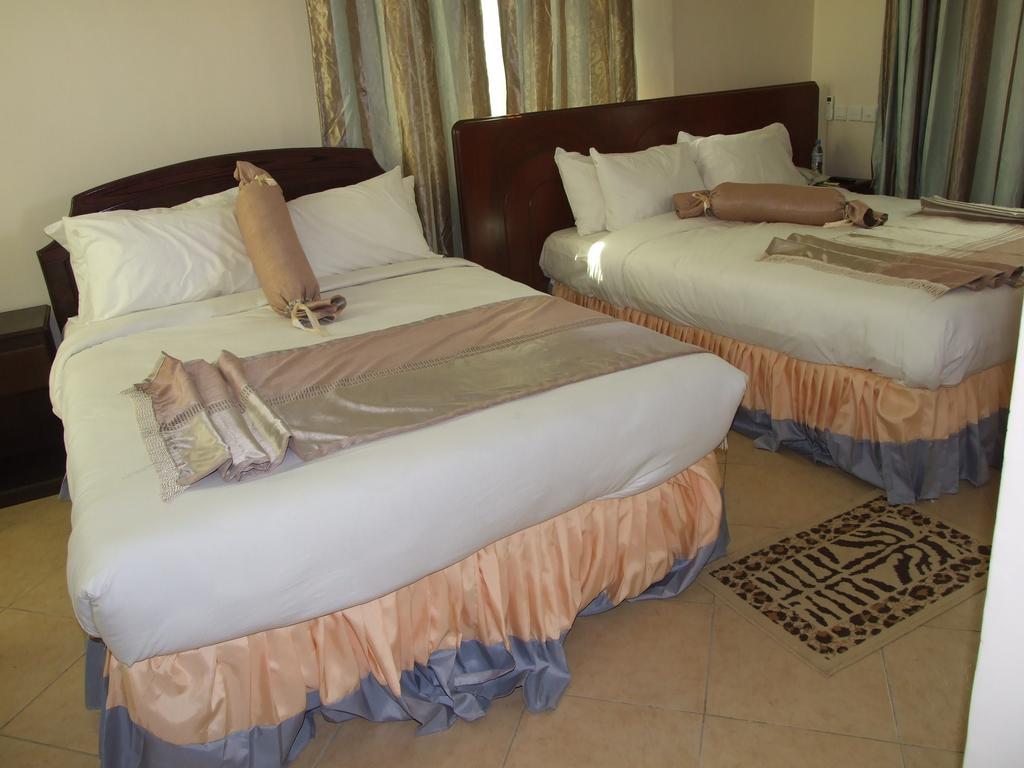 Grace Land Hotel Аруша Стая снимка
